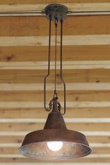 Pendant cone and tubes in aged brass. Aldo Bernardi. 