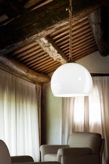 Single pendant lamp in aged brass and shiny white opal glass Farmacia. Aldo Bernardi. 