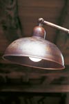 Dome wall lamp on patella in aged patinated brass and white porcelain. Aldo Bernardi. 