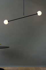 Two Spheres black metal stem and opal glass globes pendant lamp. Atelier Areti. 