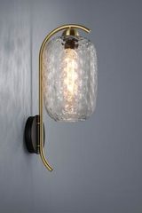 Golden and design wall lamp with carved glass Golden and design wall lamp with carved glass