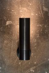 Benda patined black cylinder wall light. Gau Lighting. 