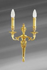 Applique Louis XVI patiné vieil or, deux lumières. Lucien Gau. 