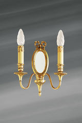 Applique miroir à deux lumières, style Louis XVI en bronze doré. Lucien Gau. 