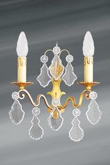 Sobre applique dorée Louis XV cristal de bohème 2 lumières. Lucien Gau. 