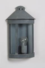 Old zinc half-cylinder exterior wall light  Luxembourg. Lum’Art. 