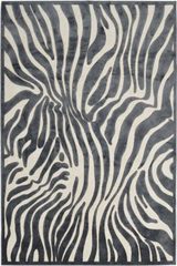 Tapis soyeux imitation peau de zèbre beige et noir 60X110. MA Salgueiro. Tapis soyeux imitation peau de zèbre beige et noir 60X110. MA Salgueiro.