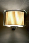 Mercer beige ribbon wall light. Marset. 