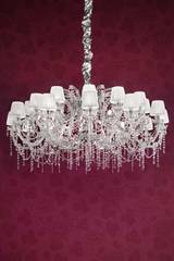 White, chrome-plated metal and clear crystal designer chandelier . Masiero. 