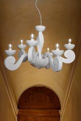 White contemporary chandelier in scrolls Botero 10 lights. Masiero. White contemporary chandelier in scrolls Botero 10 lights. Masiero.