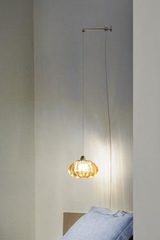 Diamante bedside wall lamp on bracket in amber solid Murano glass. Vistosi. Diamante bedside wall lamp on bracket in amber solid Murano glass. Vistosi.