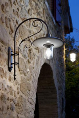 Large outdoor wall lamp with curved arm in patinated brass - Exterior wall lights by Aldo Bernardi