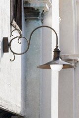 Large outdoor wall lamp with scrolled arms - Exterior wall lights by Aldo Bernardi