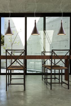Funnel pendant in fibre cement with corten finish