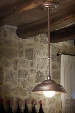 Patinated copper pendant on rigid rod adjustable in height