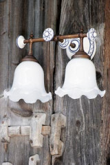 Double wall lamp with patinated brass rod, decorated white porcelain and pleated opal glass - Wall lights by Aldo Bernardi