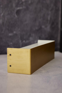 Linear rectangular wall light in gilded metal
