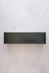 Linear rectangular wall lamp in raw metal