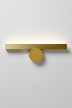 Golden wall lamp, lighting up