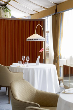 Thea classic off-centred floor lamp in golden brass