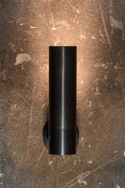 Benda patined black cylinder wall light - Wall lights by Gau Lighting