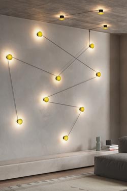 Azou wall lamp with black marble discs 3 lights