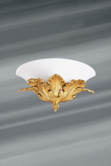 Wall lamp with gilded bronze leaves and white opal glass - Wall lights by Lucien Gau