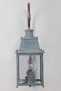 19th century exterior wall light in old zinc on a bracket  Gare