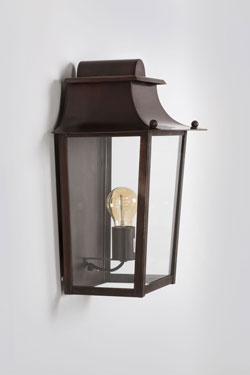 Alma outdoor lantern with patinated brass finish
