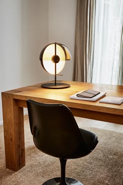 Theia black metal and smoked methacrylate half-sphere table lamp