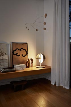 Theia black metal and smoked methacrylate half-sphere table lamp