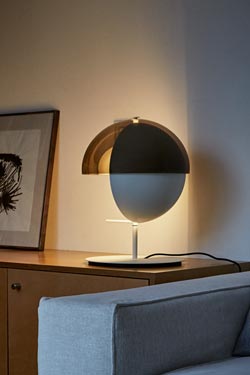 Theia black metal and smoked methacrylate half-sphere table lamp