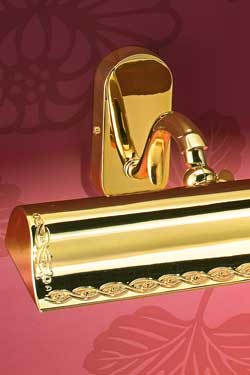 Large flared polished gold-plated picture light with classical decoration