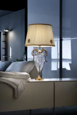 Table lamp with fluted clear crystal base and antique-gold fittings