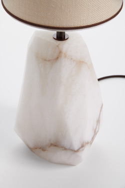 Monolite table lamp in raw alabaster block and linen