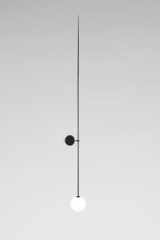 Long black patinated brass applique with a white globe. Mobile Chandelier10 - Wall lights by Michael Anastassiades