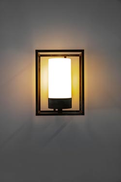 Cubic large wall lamp in antique brass lantern