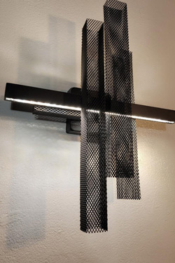Metropolis matt black metal mesh wall light